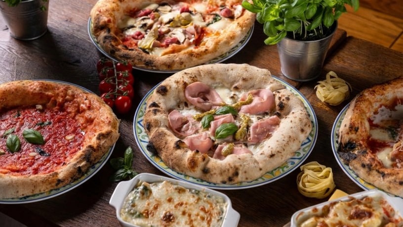 Italian pasta and pizza on the table