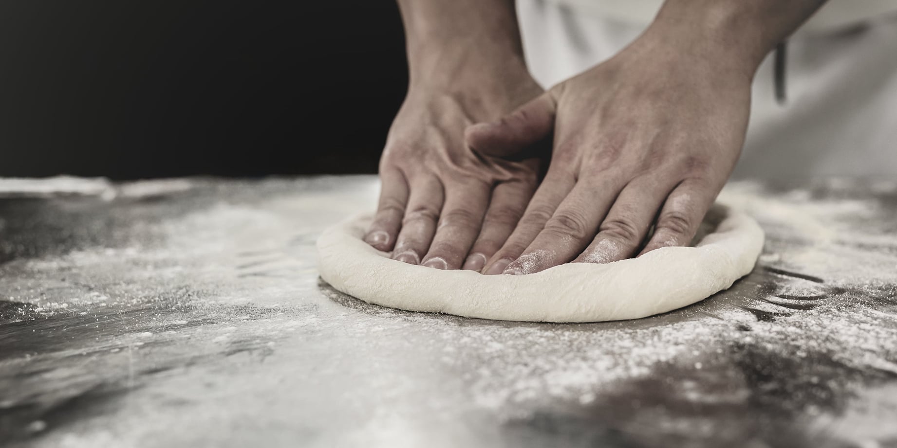 Authentic Neapolitan pizza preparation at Papaiolo pizzeria Prague