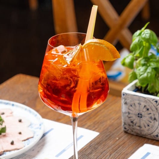 Aperol Spritz cocktail - prosecco with Aperol and tonic at Papaiolo pizzeria